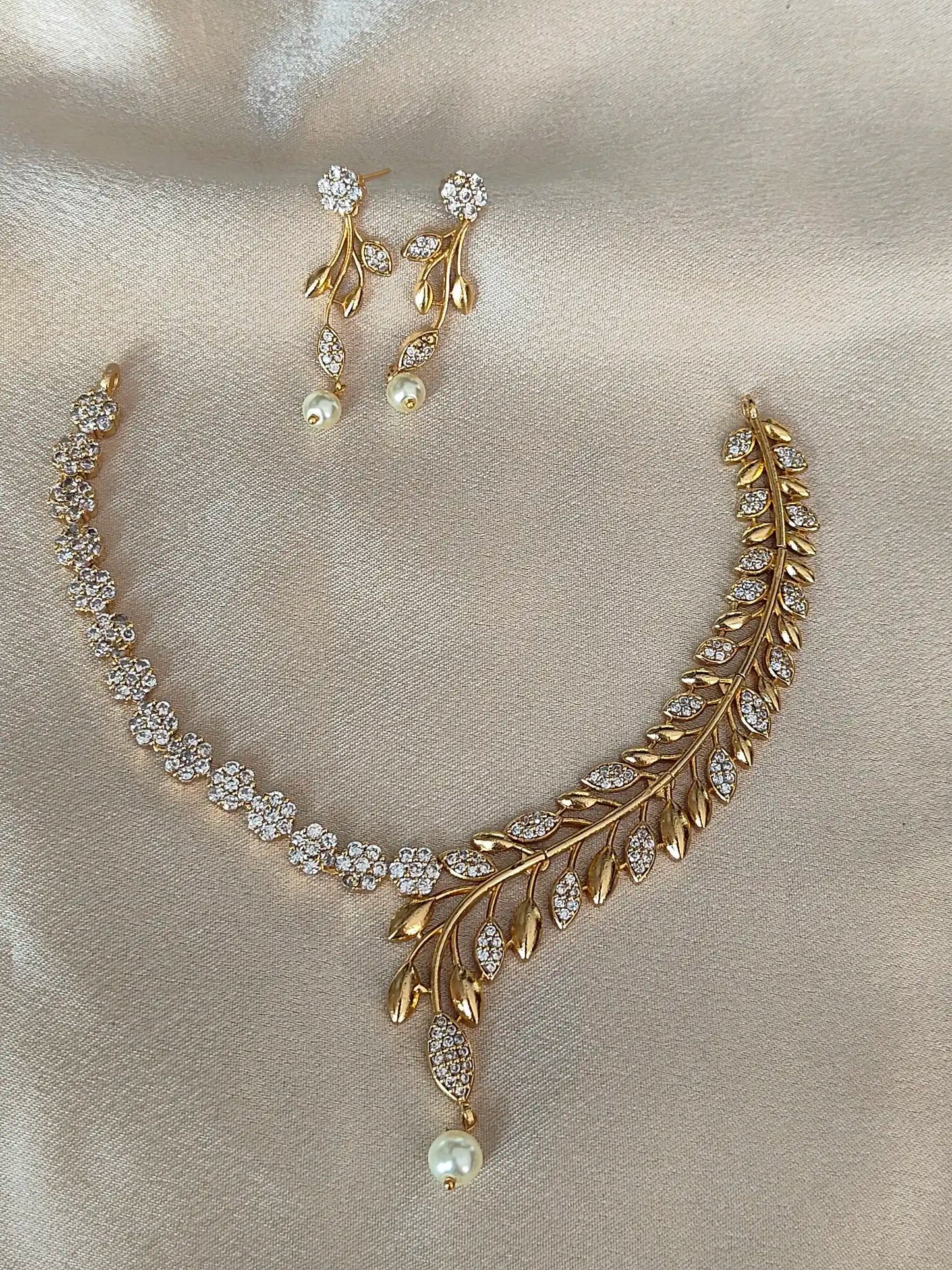 Gold Leaf Motif AD Necklace Set with Pearl Drop. Code - 144