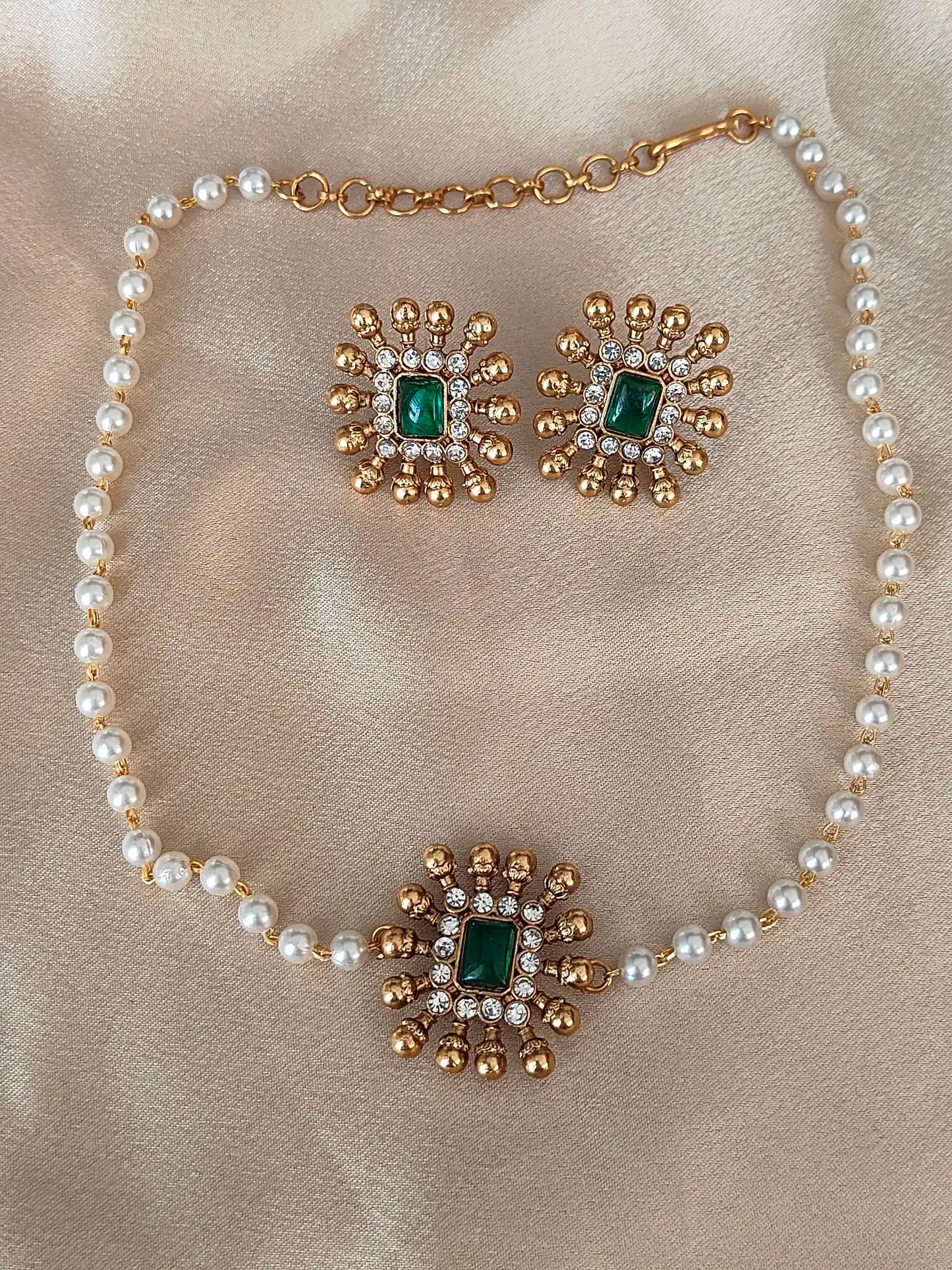 Regal Pearl Choker Set with Emerald Green Centerpiece. Code - 141