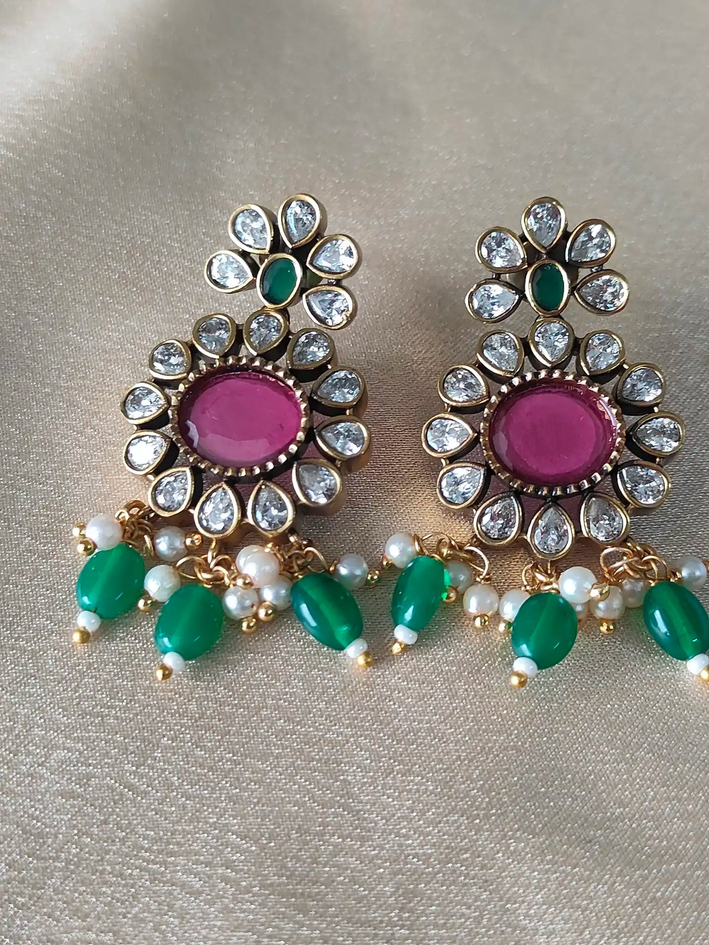Peacock Inspired Kundan Necklace Set – Emerald & Ruby
Code -131