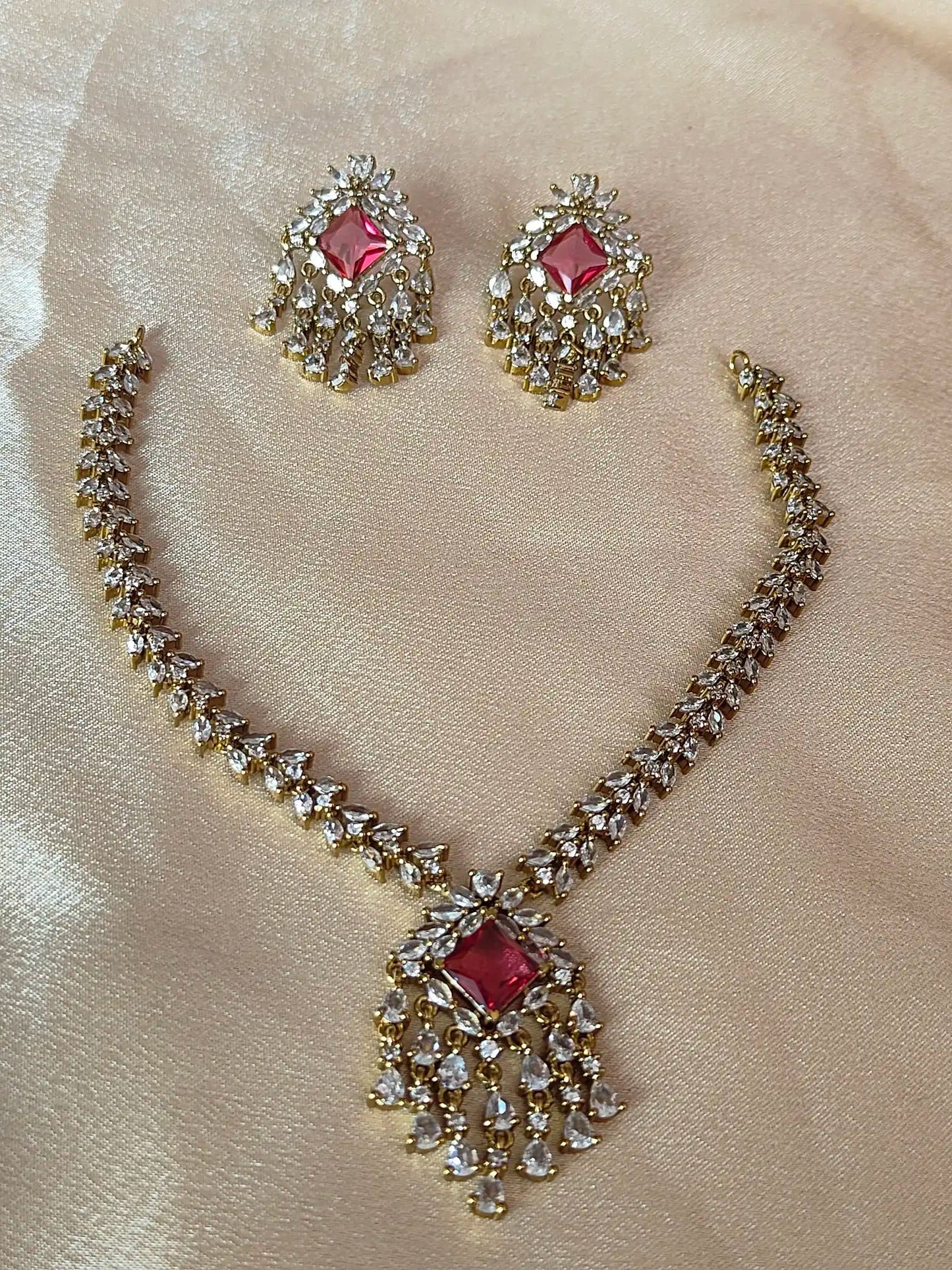Radiant AD Stone Necklace Set with Pink Centerpiece. Code - 143