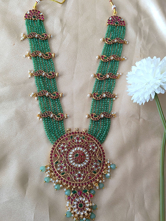 Grand Temple-Style Peacock Haram Set with Kundan and Green Bead Detailing