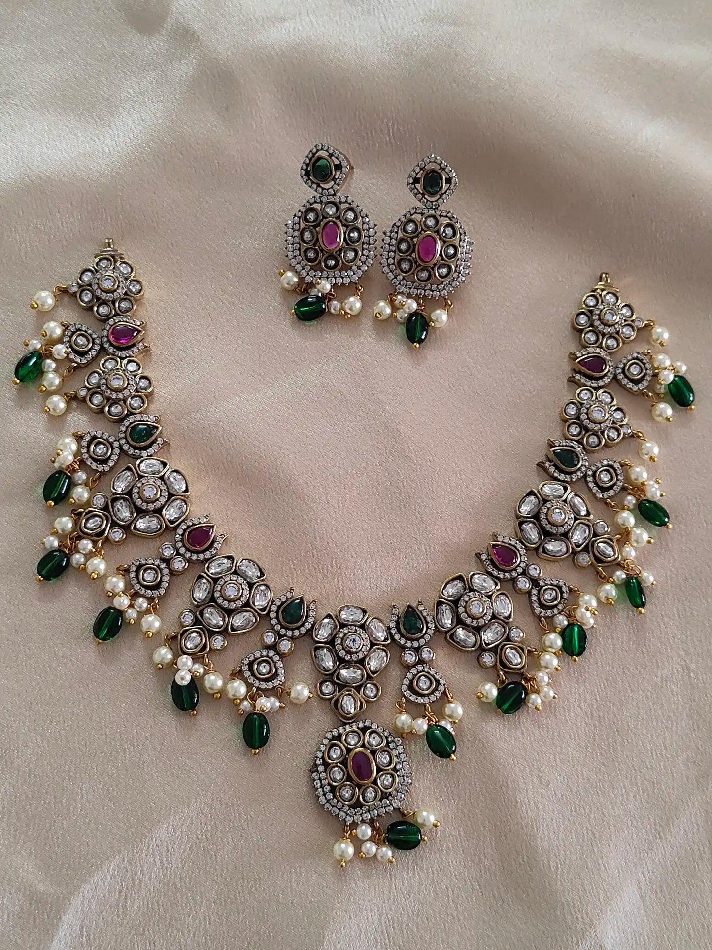 Antique Kundan Bridal Set with Ruby Stones & Emerald Drops
Code : 127