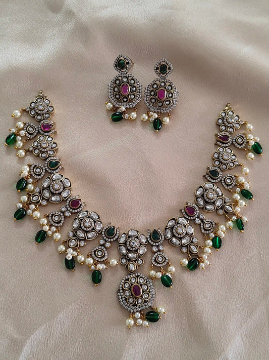 Antique Kundan Bridal Set with Ruby Stones & Emerald Drops
Code : 127
